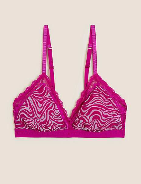 Product A distinctive print gives this bralette from our Boutique collection a vibrant feel. The non-wired design enhances your natural shape and features padded cups for a smooth look under clothing. It is crafted from super-soft microfibre fabric with delicate lace trims for a feminine touch. Branded logo elastic on the underband gives a signature finish. Made with recycled nylon.